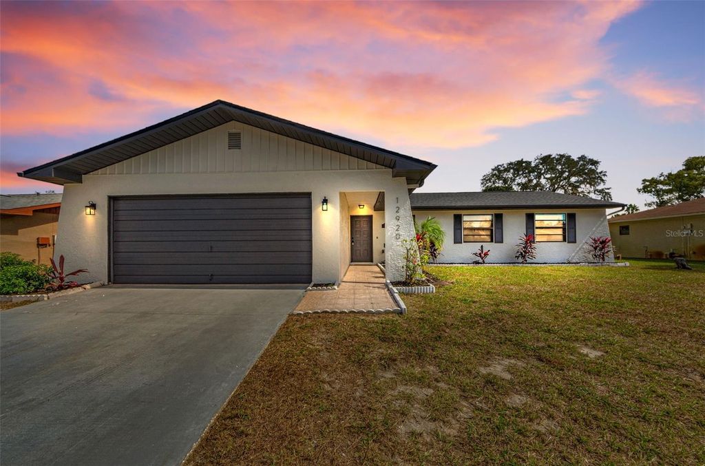 Photo of 12920 Walnut Tree Lane, Hudson, FL 34669 (MLS # TB8440796)