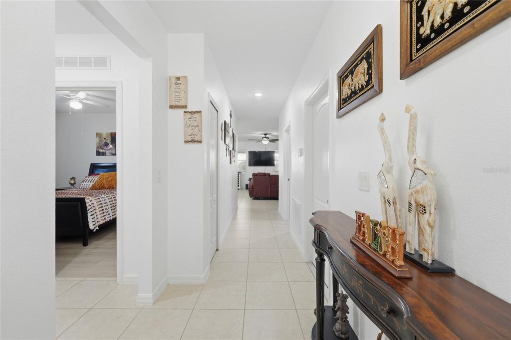 Photo of 447 Pinecrest Loop, Davenport, FL 33837 (MLS # O6358610)