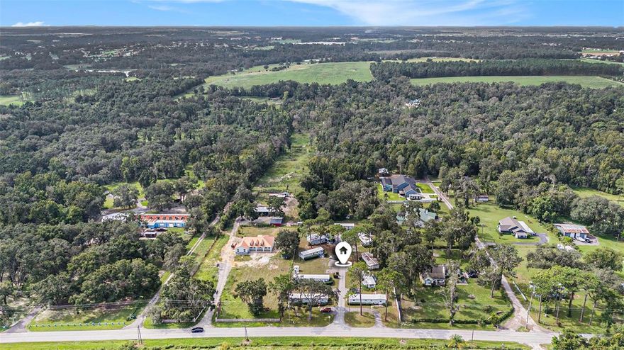 Located just off Old St. Joe Road, east of Curley Road in Dade City, this 10± acre parcel delivers immediate income and excellent long-term growth potential. The front of the property features 9 leased mobile homes providing steady cash flow, while behind them about 7± acres of undeveloped land await your vision. Whether that means building a custom family home, expanding rentals, or full site redevelopment. Multiple zonings include Single-Family Rural (S1-1), SZ2-LO, RMHPCL2-1 (Trailer Park), and RV Park / O-OV. This land supports both traditional residences and rental/mobile home/RV uses, giving you flexibility now and in the future. The site includes newer septic systems and upgrades to the mobile homes, offering move-in readiness for tenants and peace of mind for the next owner.

The surrounding area is undergoing rapid development! Pasco County’s population growth has triggered a surge of new residential and commercial projects nearby, enhancing infrastructure, access, and amenities. For families wanting country-side living with convenience, developers seeking high-demand land, or investors looking for steady income with upside potential, this property offers the best of all worlds. It’s just minutes from Downtown Dade City, US Hwy 301/Hwy 98, State Road 52, and I-75, easy access without compromising privacy or rural charm. **PLEASE do not drive or walk onto the property, and do not disturb tenants.
