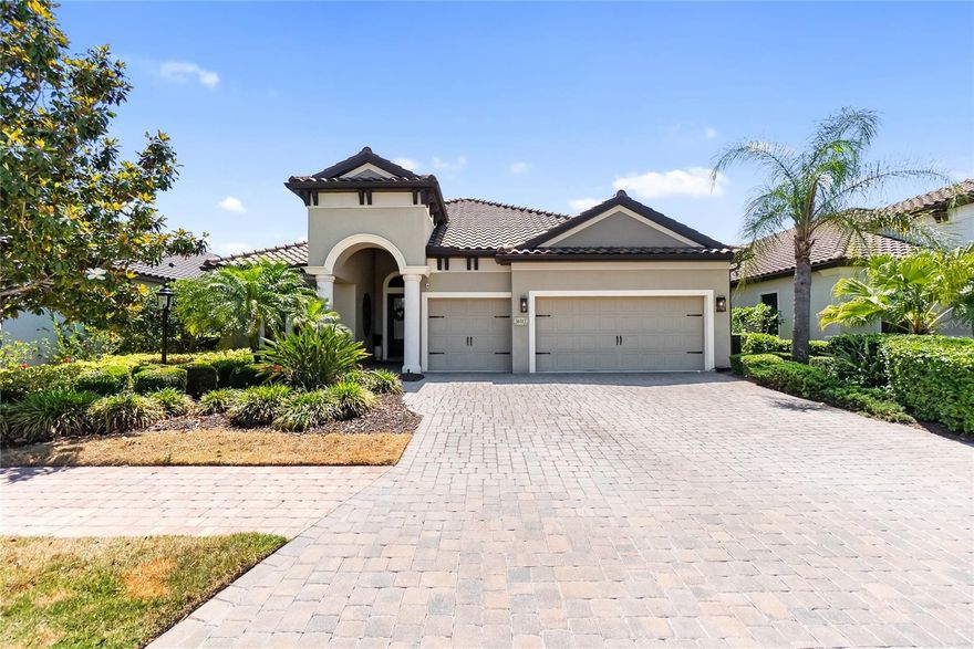 Tucked at the end of a quiet cul-de-sac in Collingtree at Country Club East, this 4BR, 3.5BA residence with a dedicated office offers a thoughtful layout, quality upgrades, and private preserve views. With a 3-car garage and well-designed indoor and outdoor areas, the home is built for both everyday comfort and ease of entertaining. Step inside and the openness is immediate. Soaring ceilings and an open layout create an airy feel, while natural light moves easily through the main living areas. Tile flooring grounds the interior, with wood accents adding warmth in select rooms. The kitchen has been recently refaced and presents a fresh, updated look with a gas cooktop, stainless steel appliances, and new, ample cabinetry, all centered around a large island with seating. It flows seamlessly into the dining and main gathering areas, keeping everything connected for gatherings or relaxed evenings at home. The primary suite offers a private retreat with walk-in closets and a well-appointed bath featuring dual vanities, a walk-in shower, and a separate water closet. Guest accommodations are flexible for family or visitors, including an en suite bedroom with a walk-in closet. Outdoor living is enhanced by a screened lanai with a saltwater pool and spa, heated by both solar and gas, along with an outdoor kitchen, gas line for a fire feature and newly installed outdoor lighting with remote color changing feature. The preserve beyond creates a peaceful, private backdrop. Further features include a new AC system (2024), tankless gas water heater, whole-house water purification system, LED lighting, plantation shutters, and a laundry room with utility sink. The garage includes upgraded overhead storage, cabinetry, Electric Vehicle charging outlet, refrigerator with dedicated water line, and 2 workbench spaces. Residents enjoy access to The Lodge and The Retreat, offering dining, fitness, and recreational amenities, with golf, tennis, and social memberships available. Convenient to Willis Elementary and nearby shopping.