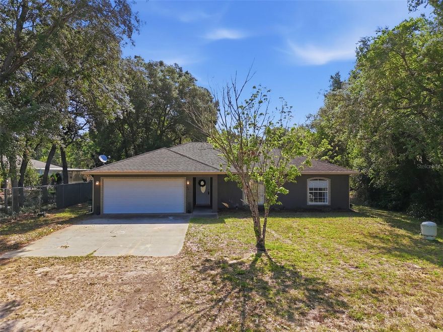 *** PRICE IMPROVEMENT *** - This beautiful Hernando Home won't last long. Included is a Bonus Lot making the homesite nearly half an acre!
Discover the perfect blend of space, comfort, and privacy in this charming 3-bedroom, 2-bath, 2-car garage concrete block home, nestled in a peaceful Hernando neighborhood. This property is a rare find — it includes an extra lot directly behind the home, giving you a total of .42 acres to spread out, garden, play, or simply enjoy the Florida sunshine.

* Property Highlights
- 2021 AC for peace of mind and energy efficiency

- Built in 2007 with a solid concrete block construction

- Open, airy floorplan with an oversized living room and dining area

- Spacious kitchen featuring a breakfast bar, stainless steel appliances, and a large pantry

- Split-bedroom layout for added privacy

- Generous primary suite with walk-in closet, linen closet, and walk-in shower

- Huge yard with fruit trees and fencing on one side — plenty of room for pets, toys, or future projects

- No HOA — enjoy freedom and flexibility

- Quiet street with few neighbors, just off a paved road

* Ideal Location
Right near the Citrus/Marion County line, you’re perfectly positioned for easy access to Ocala, Inverness, shopping, dining, medical facilities, and beautiful local parks. It’s the peaceful lifestyle you want with the convenience you need.