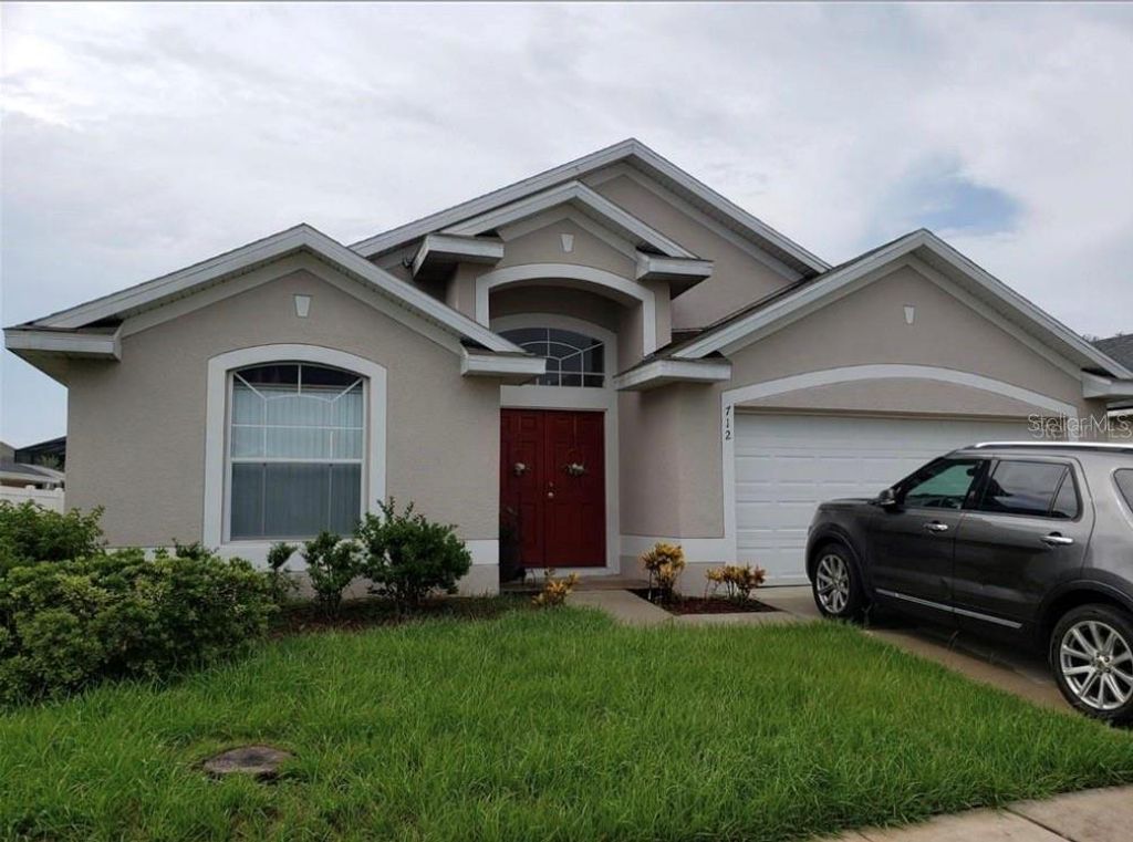 Photo of 712 Brayton Lane, Davenport, FL 33897 (MLS # S5145828)