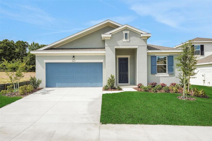 One or more photo(s) has been virtually staged. Under Construction. Experience the perfect blend of elegance, functionality, and serenity with the Lucca floorplan. Spanning 2,111 square feet of thoughtfully crafted single-story living, this home is designed for modern families seeking comfort, style, and versatility. At the heart is an open-concept layout that seamlessly connects a spacious family room, dining area, and a gourmet kitchen. The kitchen boasts a generous center island, ample counter space, and a walk-in pantry, making it an entertainer's paradise for hosting gatherings or preparing everyday meals with ease. This home offers 4 spacious bedrooms and 3 full bathrooms, ensuring plenty of room for family, guests, or even a home office. The private primary suite serves as a luxurious retreat, complete with a massive walk-in closet and an en-suite bathroom featuring dual vanities and a spa-like walk-in shower. A flexible bonus room—perfect as a study, playroom, or hobby space—adds even more adaptability to suit your lifestyle. Step outside to a covered lanai, ideal for al fresco dining or relaxing in the fresh air. The 2-car garage provides convenient storage, with optional unfinished space for customization. Nestled on an oversized lot with stunning, unobstructed views, this 1-story residence invites you to escape the ordinary and embrace tranquility. Say goodbye to burdensome CDD fees and enjoy affordability with a low $91 monthly HOA. Expansive windows flood the interior with natural light, while private outdoor spaces create a harmonious flow between indoors and out—perfect for those craving a peaceful haven with endless vistas. Whether you're starting a new chapter or downsizing without compromise, the Lucca floorplan delivers timeless appeal and everyday luxury.