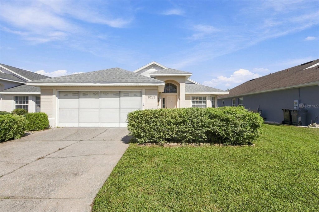 Photo of 1022 Challenger Avenue, Davenport, FL 33897 (MLS # O6441333)