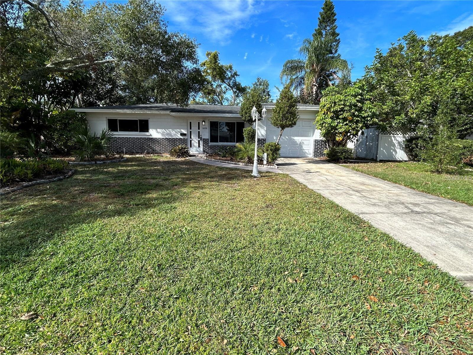 2 Bedroom, 1 Bath block home located in a NON FLOOD ZONE. NO Flood Insurance Needed! - Newer vinyl flooring, updated bathroom, new Dishwasher and new Water Heater. Located in the Heart of St.Petersburg, this home is centrally located, 15 minutes from vibrant Downtown, and 30 minutes from most popular beaches. 10 Minutes to Interstate 275 and 30 minutes to Tampa. Enjoy plenty of storage or parking in your 1 car garage w/ washer and dryer hookup. Roof 11 years old, A/C is strong.