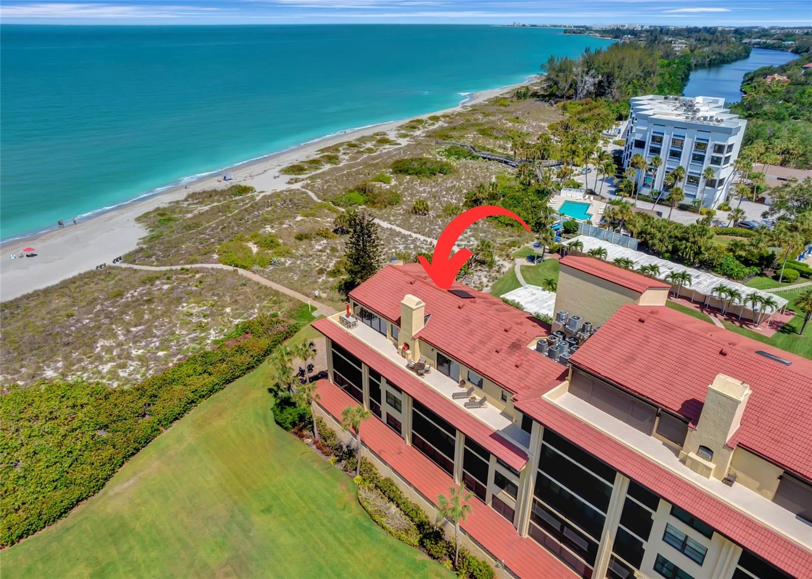 Experience the ultimate in beachfront living with this stunning, 4th-floor penthouse condominium. Featuring breathtaking year-round sunset views of the Gulf of Mexico. You can enjoy the beauty of your surroundings from the private, spacious sun deck and sunset balcony. Rarely available on Siesta Key, This 3-bedroom, 3-bathroom penthouse comes complete with a flex room with a murphy bed/4th bedroom option, plank tile flooring throughout, vaulted ceilings, and three lavish primary suites. The condo was fully remodeled in 2019 to the outside walls, including Hurricane Windows and Sliders, and is in pristine condition with a modern coastal design.
Step inside and be welcomed by a gracious foyer and dream kitchen, boasting the finest finishes and upgrades. The kitchen features shaker-style cabinets with crown molding, stunning quartzite counters, designer glass tile backsplash, and under-cabinet LED lighting. The suite of hi-end stainless-steel appliances includes a built-in oven/microwave combo, induction cooktop, and large island with a waterfall quartzite top. There's tons of storage and pull-out cabinets that lead you to the large utility room with new appliances and floor-to-ceiling storage.
The kitchen flows effortlessly into the light-filled, spacious Great Room, comprising the Living and Dining areas, all with sweeping Gulf views thanks to the wall of glass telescoping sliding doors. Also featured in the great room, is a full wet bar complete with a glass top with a custom LED light system, 2 refrigerators and ample storage for your favorite bourbon and champagne. A gorgeous octopus light feature above the bar adds a touch of elegance to the space.
The primary suites feature generous closets with built-in organizers, and luxurious en-suites. The main primary bath features a free-standing soaking tub with toto fixtures and shower stall with both a rain-head and a hand-held sprayer. The other two have beautiful floor-to-ceiling custom tile showers.
The Tortuga Club Condo delivers a plethora of upscale amenities, including secure keyless entry, heated community inside/outside pool, sauna, a beautiful sundeck complete with grills, chairs and umbrellas, beach access, club house with a full kitchen, library and dining area that can be reserved for private gatherings, boat docks, tennis courts, under-building garage parking with 2 designated spots, and loads of storage. Onsite maintenance manager, trash, water, basic cable & internet are all included.
Live in one of the finest luxury penthouses on the Gulf of Mexico, where you can experience true beachfront living where others dream to vacation. Tortuga Club is a quiet, laid-back and friendly community, where shorts and flip-flops are welcome year-round. Nearby you'll find parks, restaurants, and shopping. Don't miss out on this incredible opportunity!
This condo is being sold turn key furnished with personal items excluded.