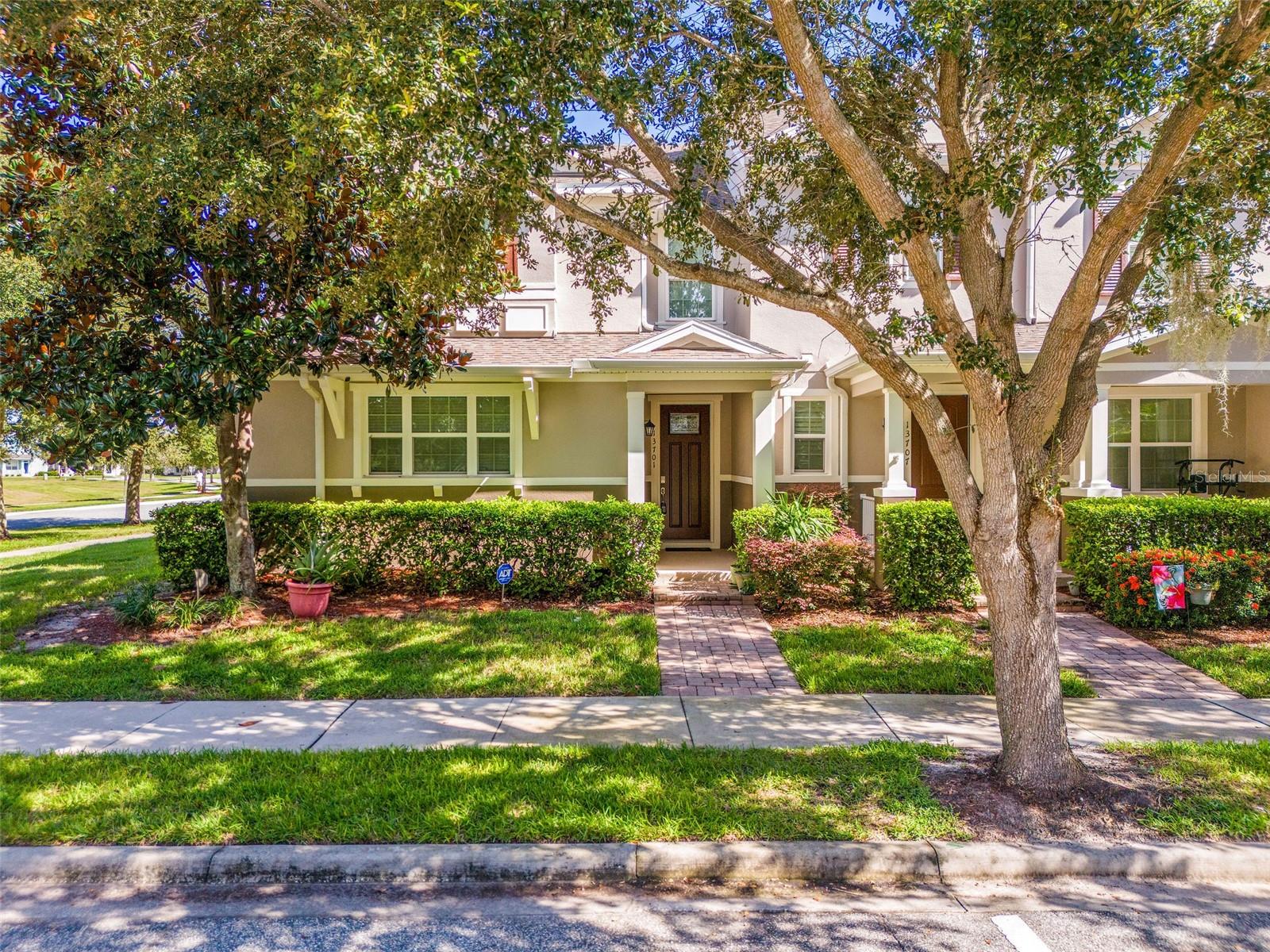 This 3 bedroom, 2.5 bathroom single family townhome with a 2 car garage awaits it's next tenants! Arriving at this end-unit townhome you are greeted by lush and manicured greenery, beautiful street trees and sidewalk paths. As you enter, there's a charming accent wall and stairs leading to the primary bedroom suite and 2 additional guest bedrooms and full bath. The primary suite features a walk-in closet and a dual bathroom vanity for, glass enclosed shower and a large soaking tub for relaxation. All bedrooms have ceiling fans, walk-in closets and are carpeted and the upstairs loft is perfect for extra living space, play room, home school or office. Downstairs has ceramic tile throughout with the great room serving as a family haven, with natural light and open to the large fully equipped kitchen. There are matching appliances including a range, microwave and double oven, a French door refrigerator freezer combo and a dishwasher. Plus there's quartz countertops, plenty of cabinet space and a convenient island for easy meal prep or kitchen gathering. The half bathroom is within easy reach for visiting guests and the laundry room has a washer and dryer for tenant convenience. Stepping out onto the screened porch you can enjoy the natural beauty from comfort of your home. Or take a walk through the beautiful neighborhood to the community pool for a swim. This well maintained home is move-in ready so schedule your tour today! Tenant requirements include: minimum gross household income of 3x the monthly rent amount, a favorable background and credit screening, favorable rental history and references, proof of income/employment. A deposit (same as rent) is due upon applicant approval (within 24 hours) to mark listing as Pending. First month's rent and last month's rent are due 7 business days prior to lease start date. The owner does not allow pets nor smoking in or around the home. Tenants are required to provide proof of renter's insurance and a $1/month convenience fee applies for use of management platform and tenant portal. Tenants are responsible to pay all utilities and put accounts in their name. Lease agreements are drafted by an attorney and are non-negotiable. Please review these requirements BEFORE requesting a showing. After viewing, listing agent will provide application link, upon request. Each adult over age 18 must apply. Application fee is $100 per applicant. If a tenant-prospect chooses to apply for one of our rental properties, that DOES NOT guarantee that the prospect's application will be approved. The application fee is NON-REFUNDABLE. Tenant approval is contingent on a lease start date within 35 days of application.