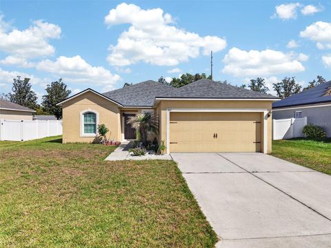 Photo of 561 Lake Cummings Way, Lake Alfred, FL 33850 (MLS # S5147868)