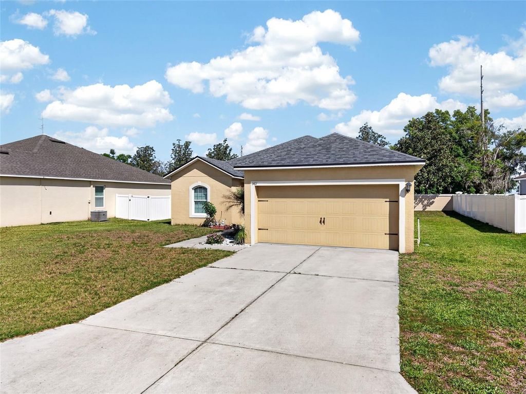 Photo of 561 Lake Cummings Way, Lake Alfred, FL 33850 (MLS # S5147868)