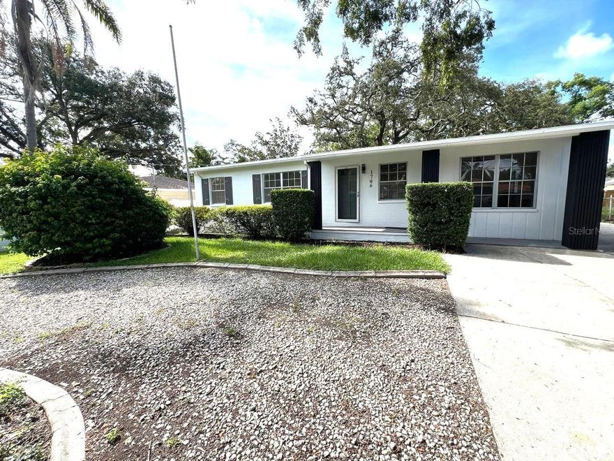 One or more photo(s) has been virtually staged. Fully renovated and move-in ready! This 4 bedroom, 3 bath home (~1,700 sq ft) blends modern finishes with flexible living. Bright kitchen with quartz countertops, shaker cabinetry, new appliances, and a side island that works perfectly as a dining table. Open dining room with a view to the backyard. Three stylishly updated bathrooms, fresh flooring/paint, and thoughtful lighting throughout. Enjoy two true bedroom suites—one with a private exterior entrance, ideal for multigenerational living, guest suite, office, or studio. Large fenced backyard with room to play, garden, or add a pool. Inside laundry and ample parking. No HOA. No CDD. Conveniently located near the golf course and everyday amenities.