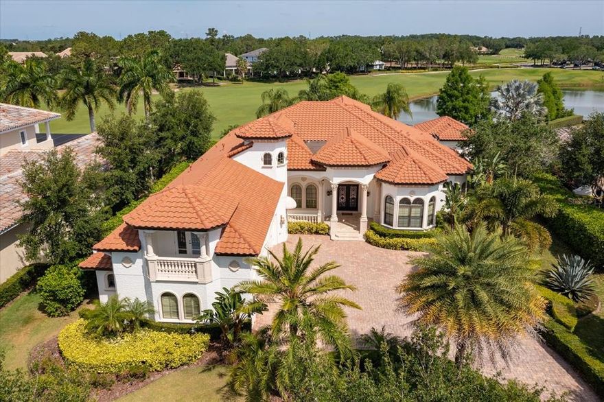 Absolutely perfect custom golf estate on the 9th Fairway of the Golden Bear Club at Keene’s Pointe. Sitting on one of the most desirable golf lots in Keene’s Pointe with panoramic sunsets, water and golf course views, this home features 6 Bedrooms, 8 bathrooms, office, cabana pool house, and a rare 4-Car Garage.  The outdoor living area of this home is just amazing in every way with a 40 foot saltwater heated pool and spa, summer kitchen, and long views of both golf and water.  It is nothing short of a dream estate, custom built with beautiful upgrades, travertine throughout the home and neutral colors that connect the perfectly designed living spaces. The floor plan is extremely desirable with four of the bedrooms on the main floor (the Master Bedroom Retreat plus 3 ensuite bedrooms).  Upstairs there are two enormous bedroom suites with private balconies, a hospitality bar and a separate bonus room/study area.  The main floor also has both formal living and dining with butler’s pantry, half bath, large laundry room and private office on the master side of the house.  An open spacious kitchen-family room spills out to the pool and patio area through a sliding wall of glass where you can enjoy the unbelievable views from the covered lanai. This outdoor living area is complete with not only the enormous pool and spa, but also the large cabana house / recreation room, a half bath, summer kitchen, and dining space all within a spacious screen enclosure.  Nearby several discreet storage areas help stow away the pool toys and other essentials. Welcome to Keene’s Pointe, a private guard gated lakefront and golf course community featuring the Golden Bear Country Club and the renown 18-hole Jack Nicklaus Signature Course.  Your golf estate awaits you.