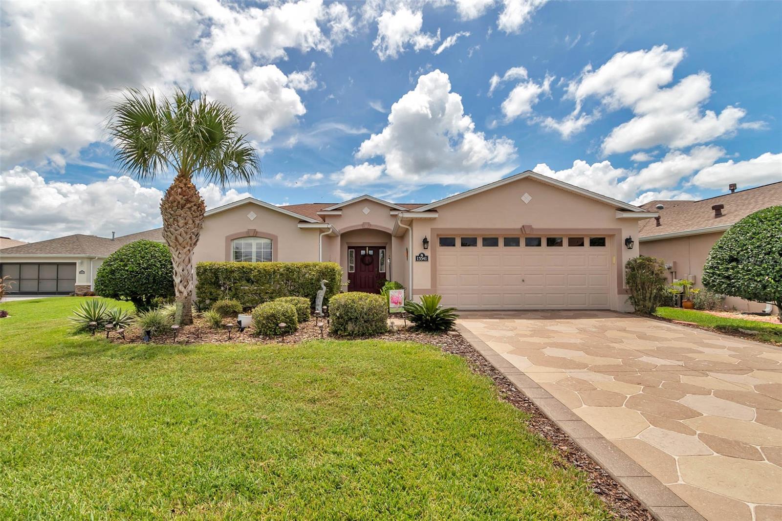 Nestled in the vibrant 55+ community of SummerGlen, this stunning Tarpon II model blends modern elegance with the comfort of a forever home. The spacious kitchen, a chef’s delight, boasts sleek granite countertops, convenient cabinet pullouts, and high-end stainless steel appliances. Plantation shutters grace every window, adding a touch of sophistication and privacy throughout the home. The thoughtfully designed guest wing can be entirely closed off, offering complete privacy for visitors or family. Step outside to a large enclosed lanai that opens to a beautifully crafted paver patio, where you can unwind while savoring breathtaking views of the adjacent golf course. With a roof replaced in 2023, this home offers peace of mind for years to come. The SummerGlen community elevates your lifestyle with resort-style amenities, including a large walk-in pool paired with an expansive hot tub, a fully equipped gym, and an 18-hole golf course. Enjoy friendly competition on the bocce ball, pickleball, horseshoe, or shuffleboard courts, or nurture your green thumb in the community garden. RV parking and a softball field add to the endless recreational opportunities. Embrace the SummerGlen lifestyle in this meticulously maintained home—schedule a tour today to see it for yourself!