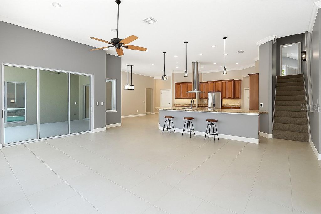 Photo of 4848 Keeneland Circle, Orlando, FL 32819 (MLS # O6341415)