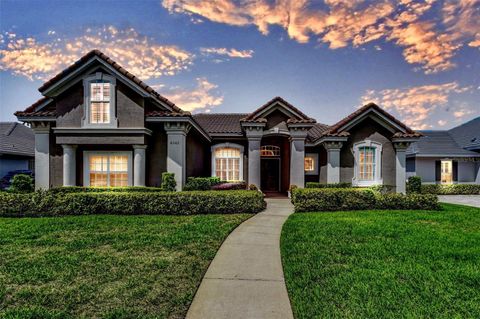 Photo of 4848 Keeneland Circle, Orlando, FL 32819 (MLS # O6341415)