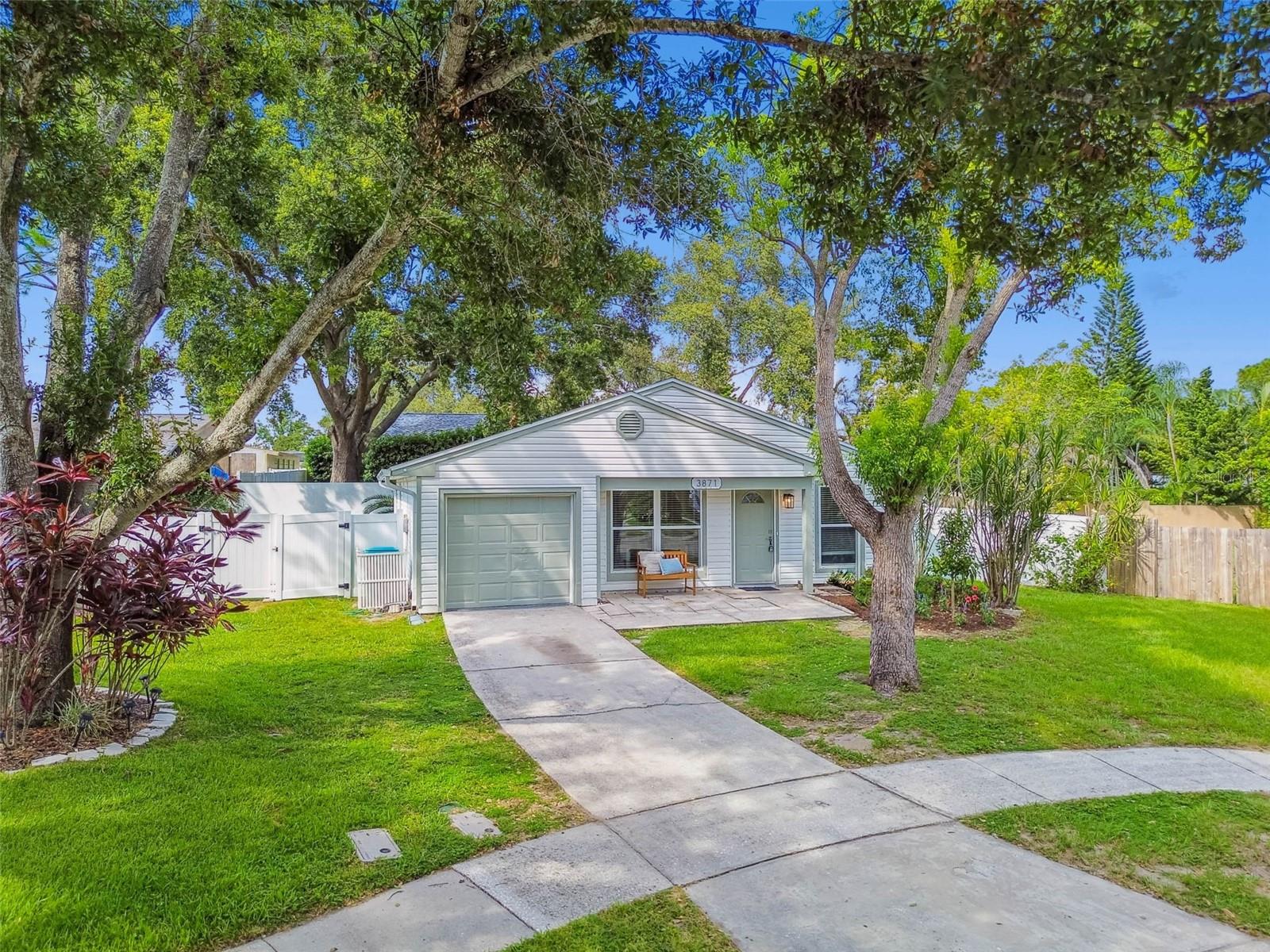 Welcome to your beautifully reimagined Palm Harbor residence, where comfort meets sophistication. This stunning 3-bedroom, 2-bath home has been meticulously redesigned with top-tier upgrades and thoughtful finishes throughout.
Set on an expansive 8,400+ square foot fully fenced lot, the property offers ample space to create your dream outdoor oasis—whether it's adding a resort-style pool, parking your boat or RV, or simply enjoying the freedom of a generous backyard for pets and play.
Step inside and be greeted by soaring 14-foot ceilings that elevate the sense of space and light, instantly making the home feel more expansive than the square footage suggests. Luxury wide-plank vinyl flooring flows throughout, seamlessly connecting the open-concept living areas.
The chef’s kitchen is a showstopper—featuring brand-new custom cabinetry, gleaming quartz countertops, imported tile backsplash, and a full suite of stainless steel appliances. Every detail has been curated to offer style and function in equal measure.
The guest bathroom has been beautifully updated with modern finishes and designer tile. The spacious primary suite offers a private retreat with an elegant ensuite bathroom complete with new vanity and imported stonework.
Major mechanical upgrades provide peace of mind for years to come: new impact windows (2020), new A/C (2023), and a brand-new roof (2024).
Ideally located in a sought-after Palm Harbor neighborhood, this home combines timeless design with practical luxury. Priced to sell—schedule your private showing today before this opportunity slips away.