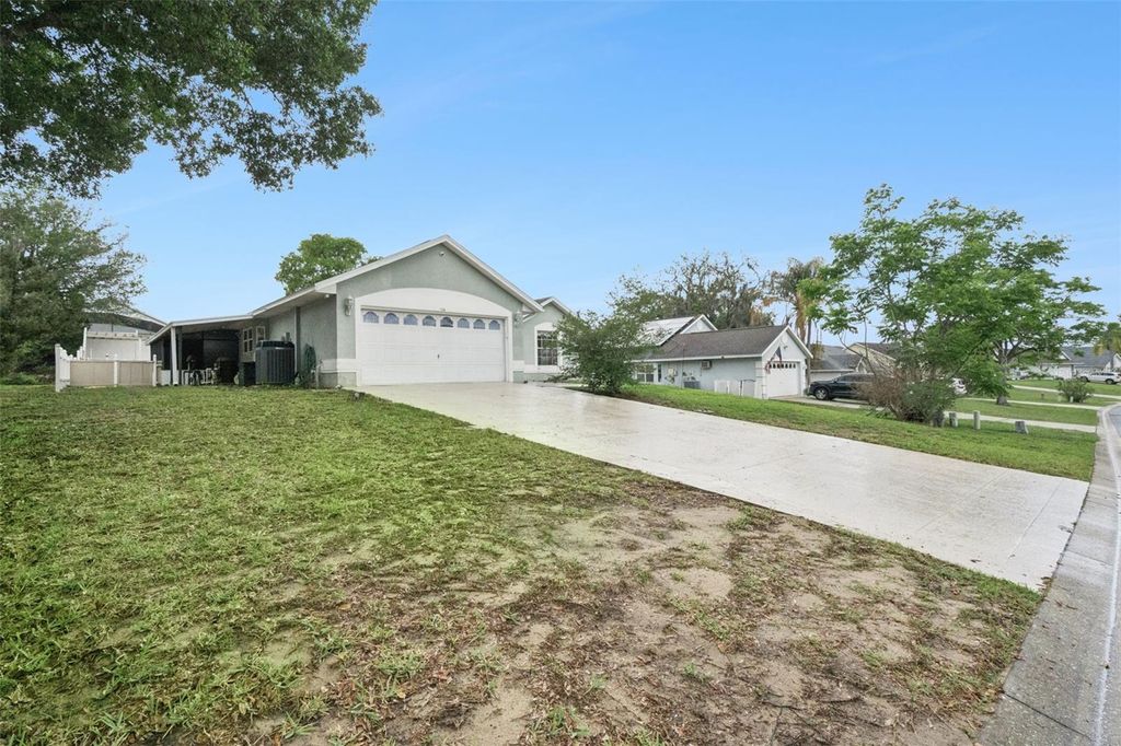 Photo of 604 Bent Oak Loop, Davenport, FL 33837 (MLS # S5145542)