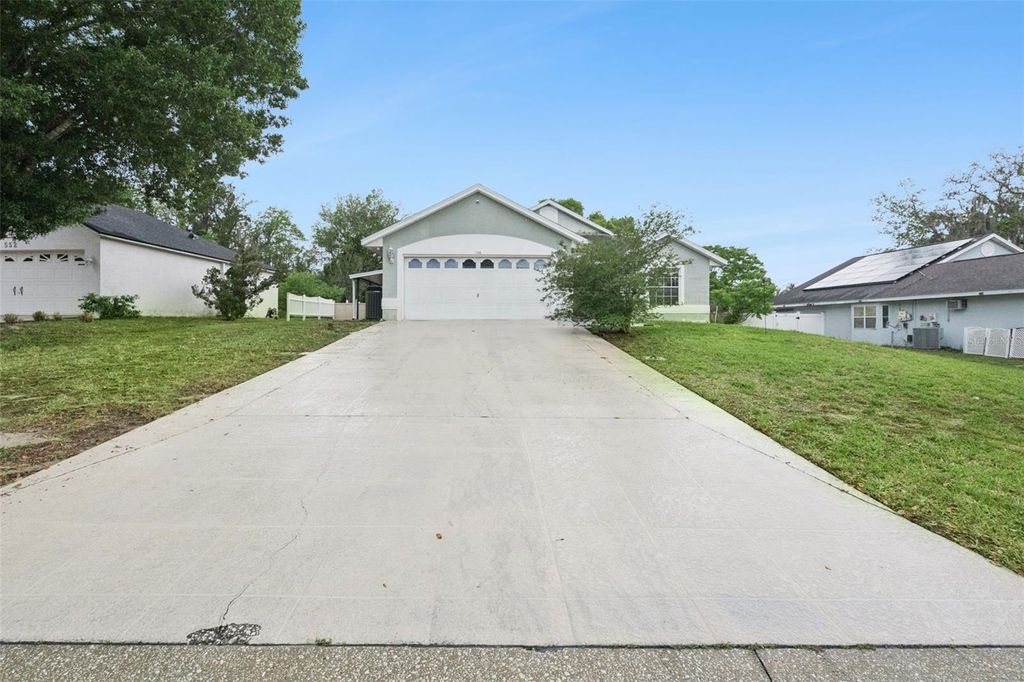 Photo of 604 Bent Oak Loop, Davenport, FL 33837 (MLS # S5145542)