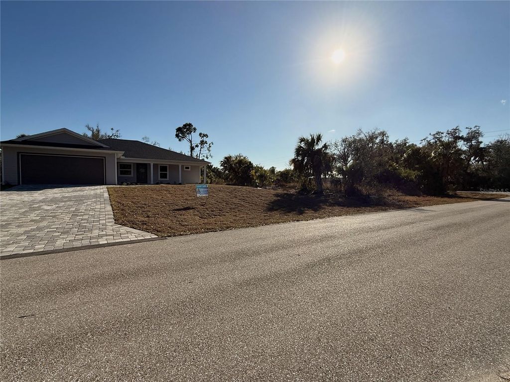 Photo of 16411 Strauss Avenue, Port Charlotte, FL 33954 (MLS # C7521861)