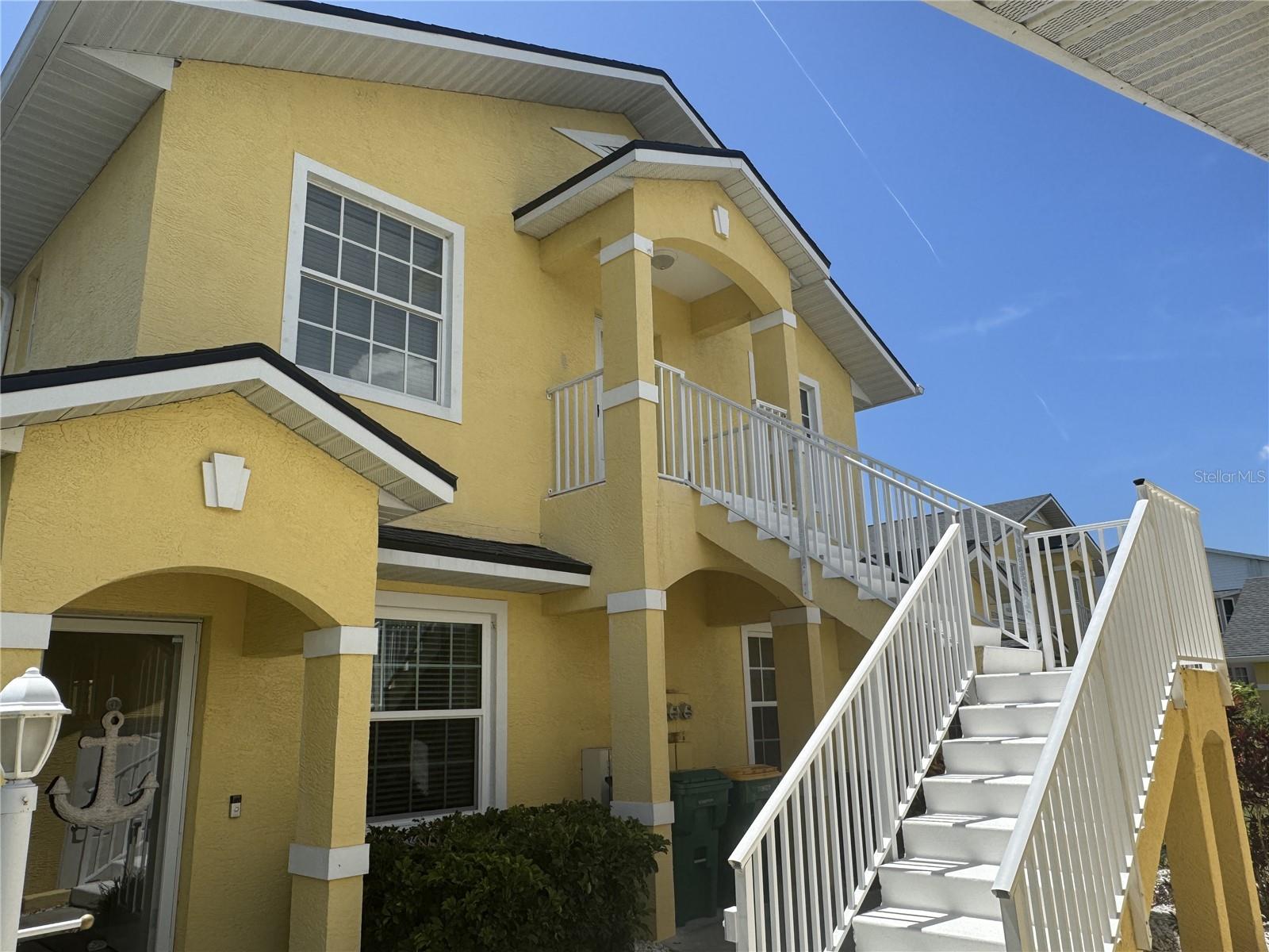 Price reduced!!!! Rarely available and beautifully maintained, this 3-bedroom, 2-bath penthouse condo with a garage and a heated pool in Al Lago Village is the ideal blend of comfort, convenience, and charm. Not in a flood zone. With 1,320 sq ft of living space, this top-floor residence boasts vaulted and tray ceilings that elevate the sense of openness, and a 22-foot screened lanai offering peaceful lake views—the perfect backdrop for morning coffee or evening wind-downs.
Inside, the home has been thoughtfully updated: new roof (2023), hot water heater (2025), garbage disposal (2024), plush new carpeting in all bedrooms (2023), and a fresh coat of paint throughout. The tile flooring keeps things cool, while the kitchen opens seamlessly to the dining and living areas for effortless entertaining.
Al Lago Village is a quiet, well-maintained community where residents enjoy access to a heated pool, beautifully landscaped grounds, and a private garage for each unit. Best of all, it’s just minutes from the sandy shores of Manasota Key and Boca Grande, plus several golf courses and marinas. A short drive leads to the restaurants, boutiques, and live music of Dearborn Street in Englewood.
Whether you're seeking a full-time residence, a winter escape, or a smart investment property, this condo offers it all—with maintenance-free living included.