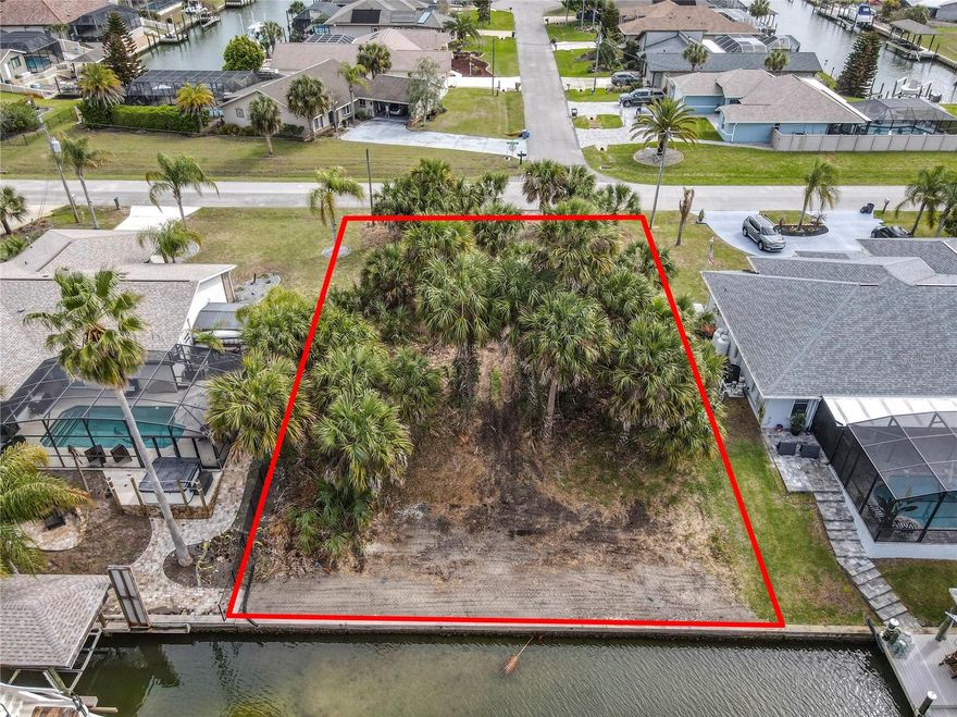Unbeatable Location and Accessibility! 80’ Bulkheaded Saltwater Canal homesite. Build Your Waterfront Home in Paradise! This is your chance to live along the water on a Saltwater Canal in Palm Coast's "Sailboat Country" neighborhood—a dream spot for boating enthusiasts. This lot with sea wall, deep water access, and no fixed bridges is only a quick 5–10-minute boat ride to the Intracoastal Waterway and then on to Matanzas Inlet. This property is one of the last prime saltwater homesites available in Sailboat country. Whether you love fishing, boating, or simply watching dolphins and manatees from your backyard, you'll find plenty to enjoy here. In addition to its tranquil waterfront setting, this property offers exceptional convenience for everyday living. Residents will appreciate being just moments away from a variety of shopping options, ensuring all your retail needs are easily met. Quality medical facilities are also close by, providing peace of mind and quick access to healthcare services when needed. Families will find reputable schools within a short drive, making this an ideal spot for those seeking a balanced lifestyle. To top it off, beautiful Florida beaches are only a short distance away, allowing you to enjoy sun, sand, and surf whenever you desire.