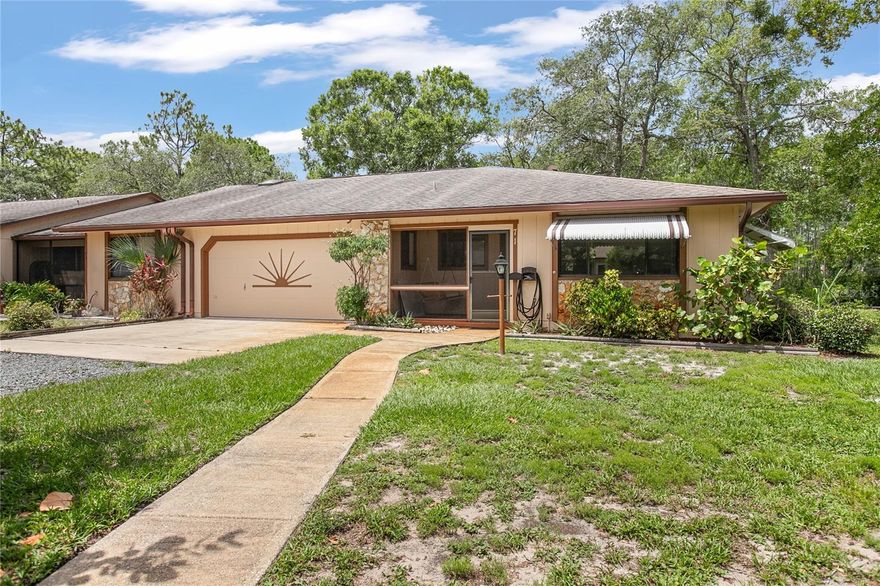 Wake up to water views in this spacious 2-bedroom, 2-bathroom, 2 car garage home nestled in a peaceful, amenity-rich community. Sitting on a beautiful waterfront lot, this property features a large, scenic pond complete with its own island. A natural haven for birds, turtles, and tranquil fishing right in your backyard. The home offers a solid layout and plenty of natural light. It has a split bedroom layout that offers comfort and privacy for guests. The kitchen is well-appointed with ample cabinet space and a convenient breakfast bar. With unbeatable proximity to the clubhouse, pool, and shuffleboard courts you are just steps away for easy access to leisure and social activities. With a low monthly HOA fee that includes cable, Wi-Fi, lawn maintenance, a Community Pool, Tennis, Pickleball, Bocci Ball & beautifully shaded walking/bike paths. Don't miss out on this waterfront home in this easy living,vibrant 55 and up community. Home comes with a seller-provided warranty. Motivated Seller!
