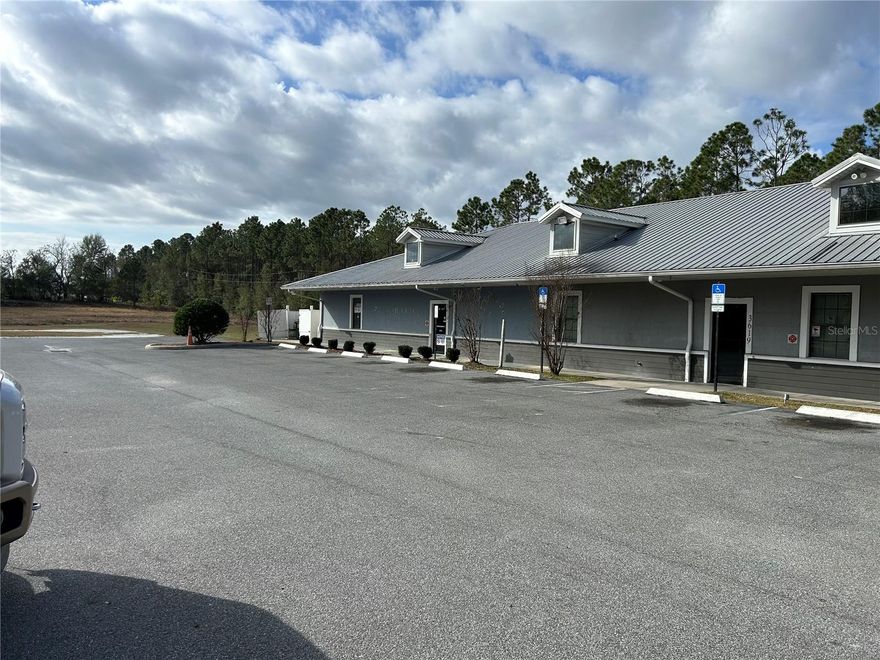 Commercial business comprised of +/- 5850 square feet. Sign space available of high traffic road. If you are looking for a place to start your own business, then check this one out! Suitable for a variety of business needs. This building was previously a dance studio. An arm's length away from the Villages. Surrounded by professional and medical businesses as well as commercial and housing developments. The outside is currently in the process of getting fully repainted. Build to suit! Your imagination is the limit! This Property also has the ability to be subdivided into two units.