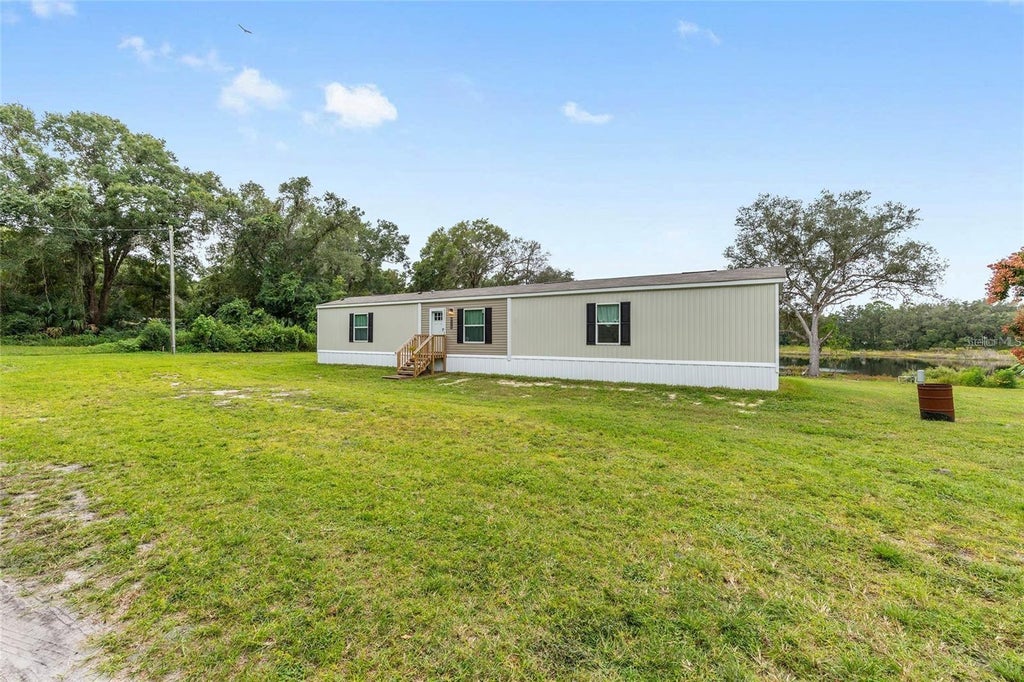 Photo of 14642 NE 111th Terrace, Fort Mccoy, FL 32134 (MLS # OM729453)