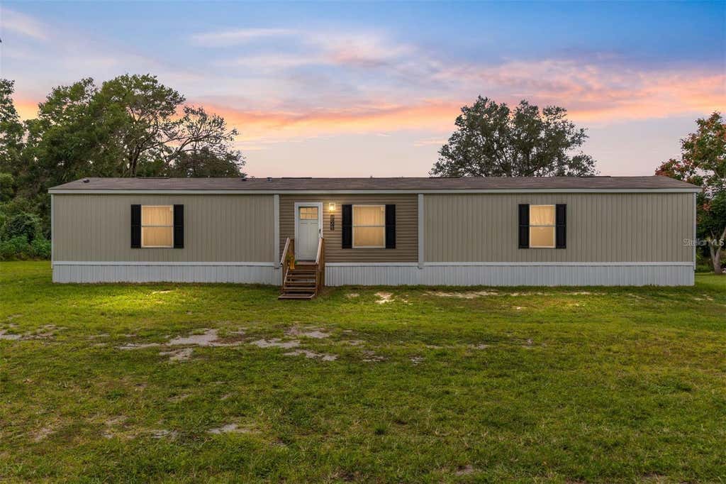 Photo of 14642 NE 111th Terrace, Fort Mccoy, FL 32134 (MLS # OM729453)