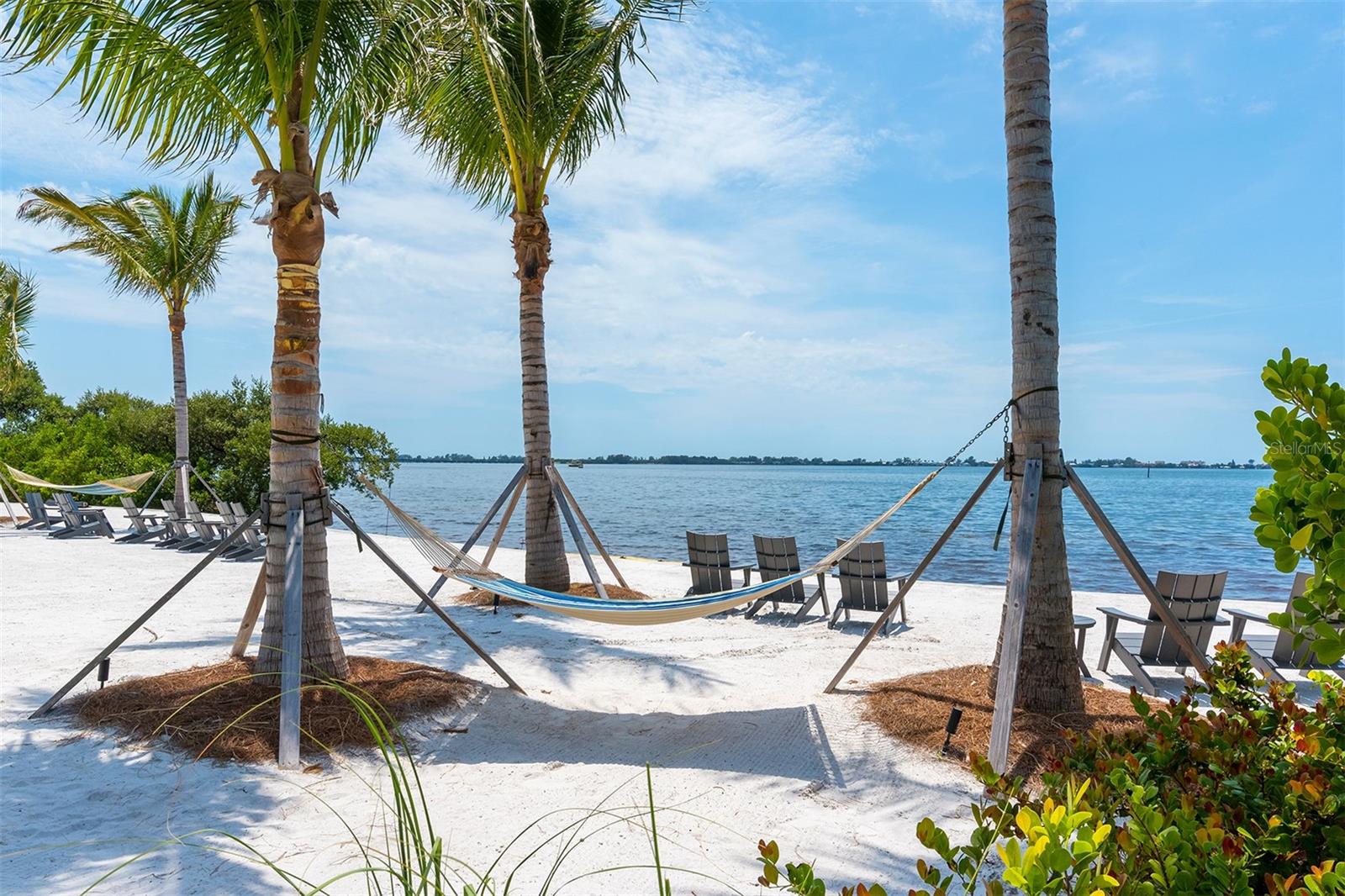 AVAILABLE OFF SEASON 2025 FOR $5,000/MONTH. BOOKED FOR JAN-MARCH 2026. BEAUTIFUL WATER VIEWS OF ANNA MARIA SOUND SURROUND YOU! Located in the gated community of Harbour Isle, this is the absolute perfect, beautifully furnished vacation home! Upon entering this home, you will be met with the open, spacious floor plan. The kitchen opens to the great room, sunroom and the amazing water views. It has 42" cabinets, stainless appliances, and breakfast island, split bedroom floorplan, the waterfront primary bedroom is on one side of the home and has a luxurious ensuite bathroom with oversized shower, double vanity and large walk-in closet. Immaculate and meticulously maintained. The master bedroom has a king size bed, and both guest rooms have a queen bed and en-suite bathrooms. This Island oasis has close proximity to the Bay, Anna Maria Island and the Gulf of Mexico. Harbour Isle has resort style amenities with 4 heated pools including a lap pool, kiddie splash park and playground, complementary kayaks for use on the 38-acre private lake and Anna Maria Sound, private sandy beach with plentiful chaises and hammocks, plus a 23,000 SF beach club with restaurant, bar, billiards and state of the art 4200 SF fitness center with yoga lawn and fitness classes. For added fun, you'll love the outdoor kitchens, fire pits, hot tub, outdoor cabana bar with multiple TV's, on-site fee for service marina (Safe Harbour Pier 77) and oodles of social activities. What could be better? This perfectly located island community is close to the Gulf beaches, restaurants, shopping and Robinson Preserve where you can kayak and bird watch. Plus, only a 4-minute drive over the causeway to the beautiful Anna Maria Island and Holmes Beach. Pure paradise awaits you! Utilities/Wifi included with a $200/month cap on electric.