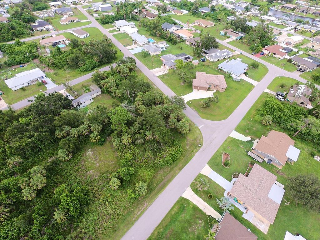 Photo of 506 Fairview Avenue NW, Port Charlotte, FL 33952 (MLS # C7523069)