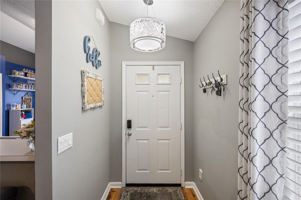 Photo of 460 Southern Charm Drive, Orlando, FL 32807 (MLS # O6344038)