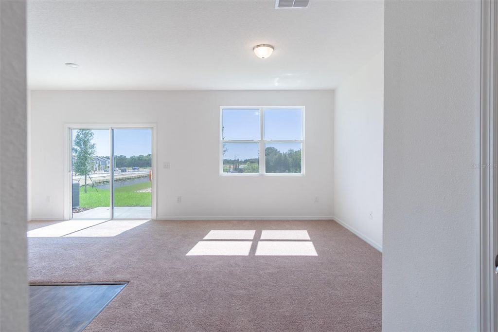 Photo of 394 Madison Drive, Davenport, FL 33837 (MLS # O6386492)