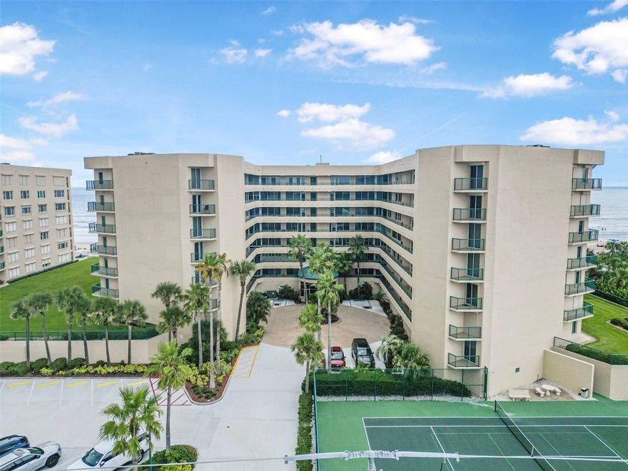 Oceanfront Serenity at The Towers in Ponce Inlet.  Wake up to the sound of waves in this stunning direct oceanfront 3-bedroom, 3-bath condominium in the sought-after Towers community. Spanning approximately 2,290 sq ft, this interior unit offers uninterrupted, panoramic views of the Atlantic from its spacious living areas and private balcony.  The open-concept layout is designed for coastal living — the living room, dining area, and primary suite all enjoy sweeping ocean vistas, while large sliders fill the home with natural light. The kitchen features ample cabinetry and counter space, perfect for entertaining after a day at the beach. Each bedroom offers its own full bath, providing comfort and privacy for guests and family alike.  Built in 1997, this well-maintained condo is part of a resort-style community with amenities that include an oceanfront pool, a fitness center, tennis courts, pickleball, clubhouse, 24 hour gated security and secure underground parking. Step outside and you’re on Ponce Inlet’s pristine beach, ideal for morning walks, shell collecting, or simply relaxing by the shore. Whether you’re seeking a full-time residence, vacation getaway, or investment opportunity, this residence delivers the perfect blend of location, lifestyle, and value.