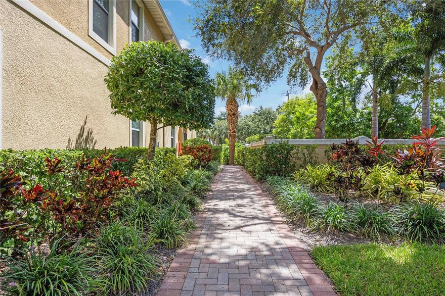 Enjoy the best of Sarasota’s Gulf Coast lifestyle from this beautifully maintained, move-in ready 3-bedroom, 2-bath condo with an attached one-car garage in the highly sought-after gated community of Stonehaven.Tucked away in a quiet, private setting, this ground-floor unit offers concrete block construction, hurricane impact windows and doors, and serene views from your screened lanai. It's ideal for year-round or seasonal living. Step inside to find an open-concept layout filled with natural light, soaring volume ceilings, and a spacious main living area that seamlessly connects the kitchen, dining, and living room. It’s perfect for entertaining or relaxing at home.The kitchen is both stylish and functional, featuring tall wood cabinetry, granite countertops, stainless steel appliances, and a peninsula breakfast bar that offers plenty of prep space and seating. Neutral tile runs through the main living spaces, while new luxury vinyl plank flooring adds warmth and durability to all three bedrooms.The spacious primary suite includes dual closets, a large step-in shower, and a linen closet, offering both comfort and convenience. Two additional bedrooms are located down a private hallway along with the second full bath and an interior laundry closet. Washer and dryer are included.Additional features include light plantation shutters throughout, HVAC replaced in 2021, and a paver driveway leading to your private garage.Tankless hot water heater installed in 2023, new garbage disposal and new garage door opener in 2024. Stonehaven is a pet-friendly, maintenance-free community with lush landscaping, a resort-style heated pool, playground, and low monthly fees that cover exterior maintenance, irrigation, and more. Located just one mile from I-75 and five miles from the light sand beaches of Siesta Key, you’ll also enjoy easy access to Legacy Trail, A-rated schools, shopping, dining, and all that Sarasota has to give. This is a rare opportunity to own in one of Sarasota’s most convenient and charming communities. Don't miss it!