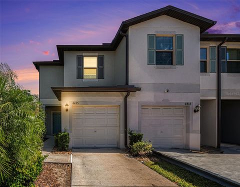 Photo of 4435 Globe Thistle Drive, Tampa, FL 33619 (MLS # O6353417)