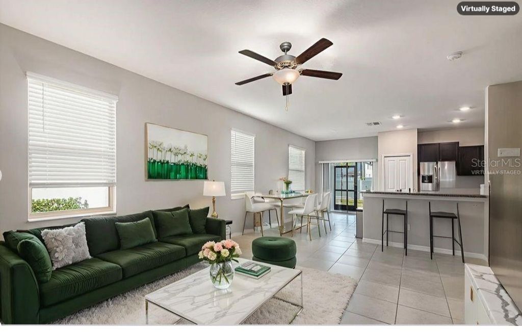 Photo of 4435 Globe Thistle Drive, Tampa, FL 33619 (MLS # O6353417)