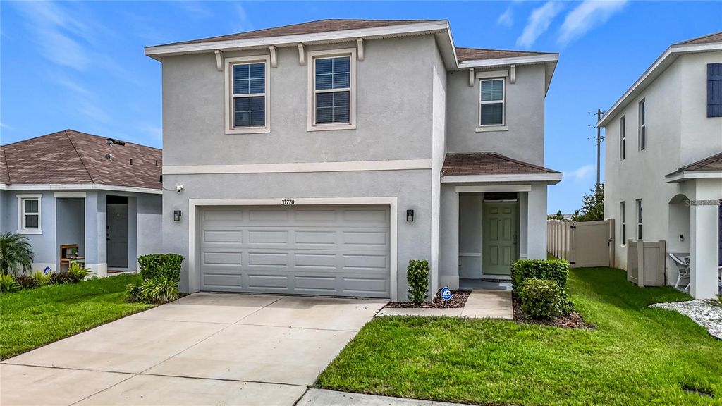 Photo of 33770 Jasmine Star Loop, Wesley Chapel, FL 33543 (MLS # TB8421647)