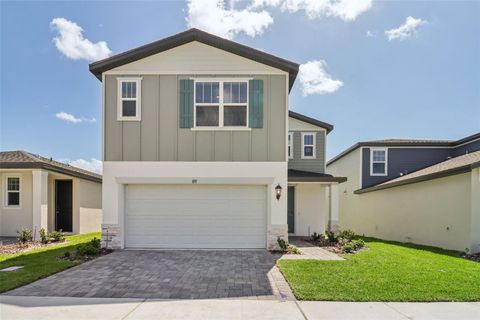 Photo of 891 Sunshower Drive, Lady Lake, FL 32159 (MLS # O6372015)