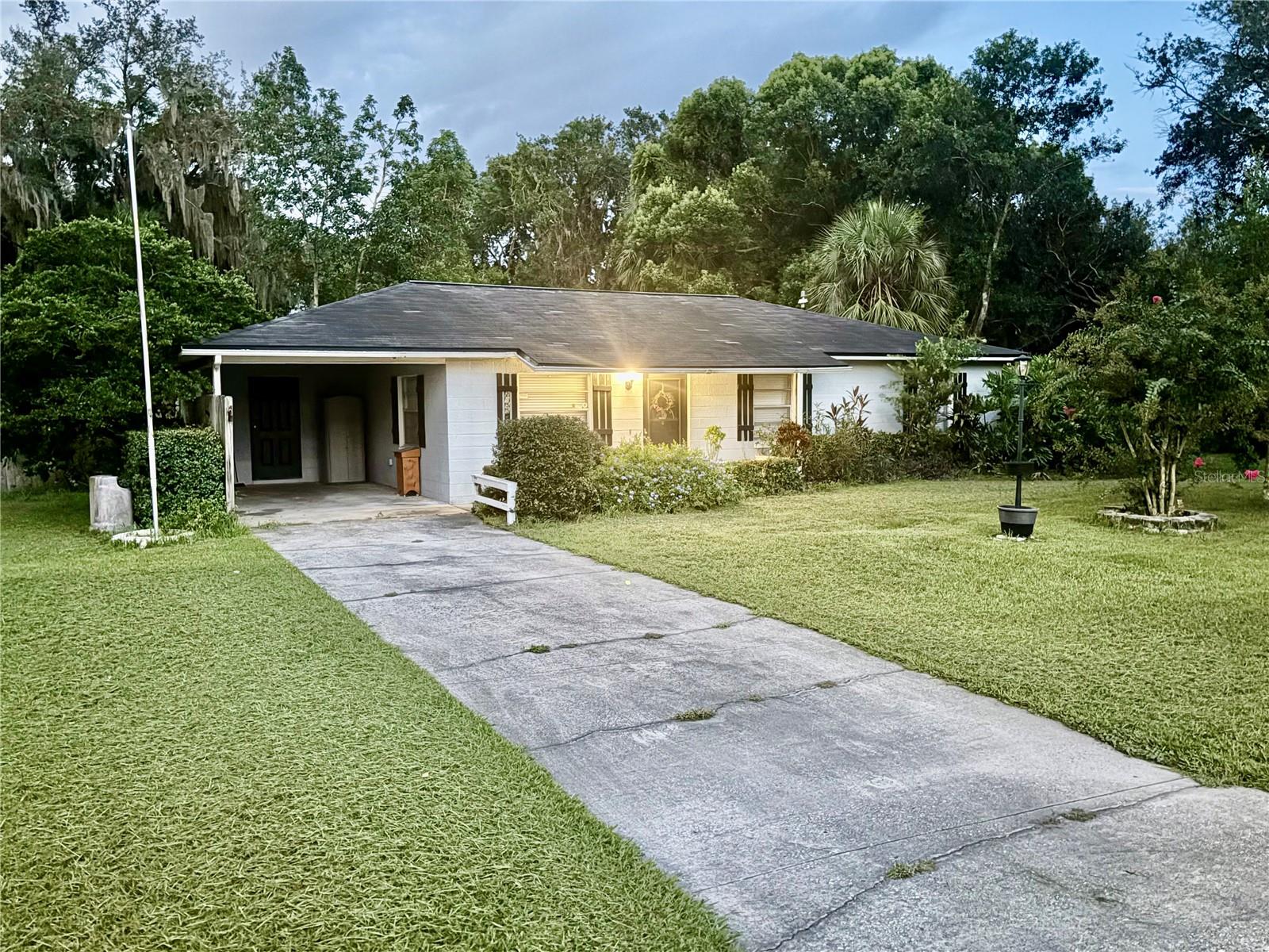 The perfect starter home for anyone who needs to live near South Lakeland or the Tampa Bay area! This home is located in established neighborhood with space between your neighbors this home is for you! No HOA, large fenced backyard with producing fruit plants and trees – avocado, orange, loquat , cherry, pineapple, papaya tree, plum, and guava.