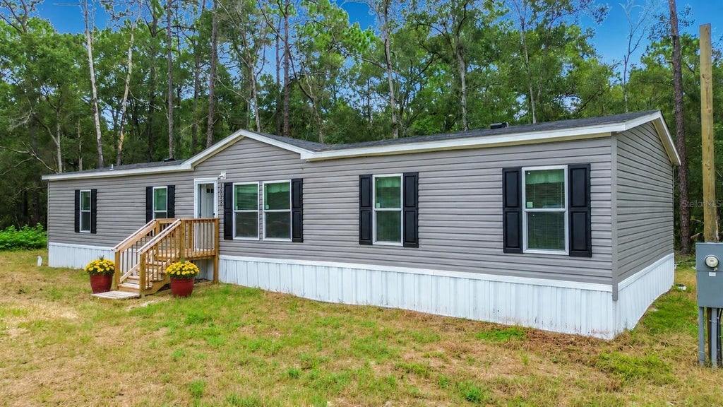 Photo of 10055 W Ohio Drive, Crystal River, FL 34428 (MLS # TB8541636)