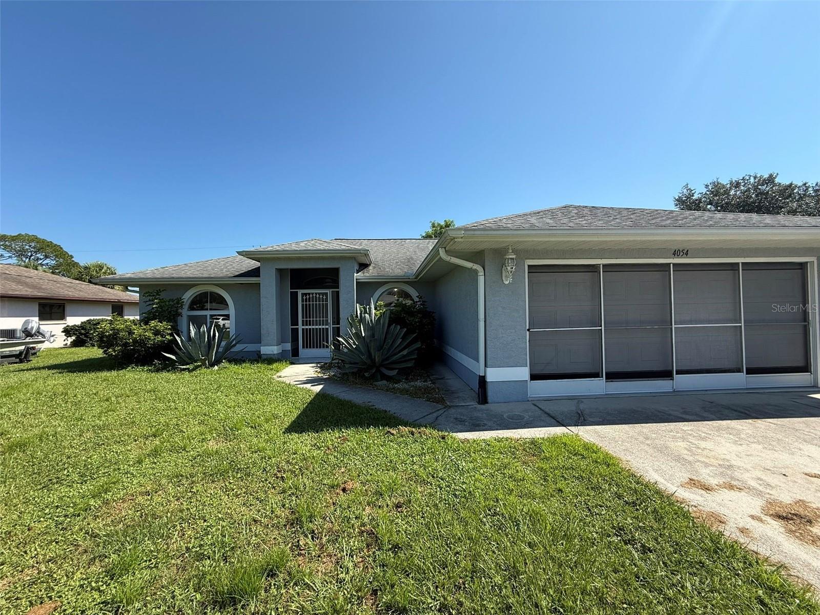 3 bedroom, 2 bath, 2 car garage home located in North Port. Home features tile in the kitchen and dining room, and brand new luxury vinyl plank flooring, and a freshly painted interior throughout the home . The large primary bedroom features his & her walk-in closets. Off of the spacious kitchen is the dining room. The screened lanai is a perfect place to drink your morning coffee and relax. Conveniently located within minutes of schools and shopping. This is a must see home that will rent fast. Don't wait until it's too late call today to schedule your appointment to view this beautiful home.