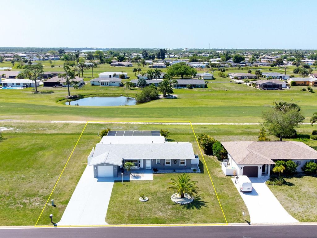 Photo of 202 Caddy Road, Rotonda West, FL 33947 (MLS # D6146788)