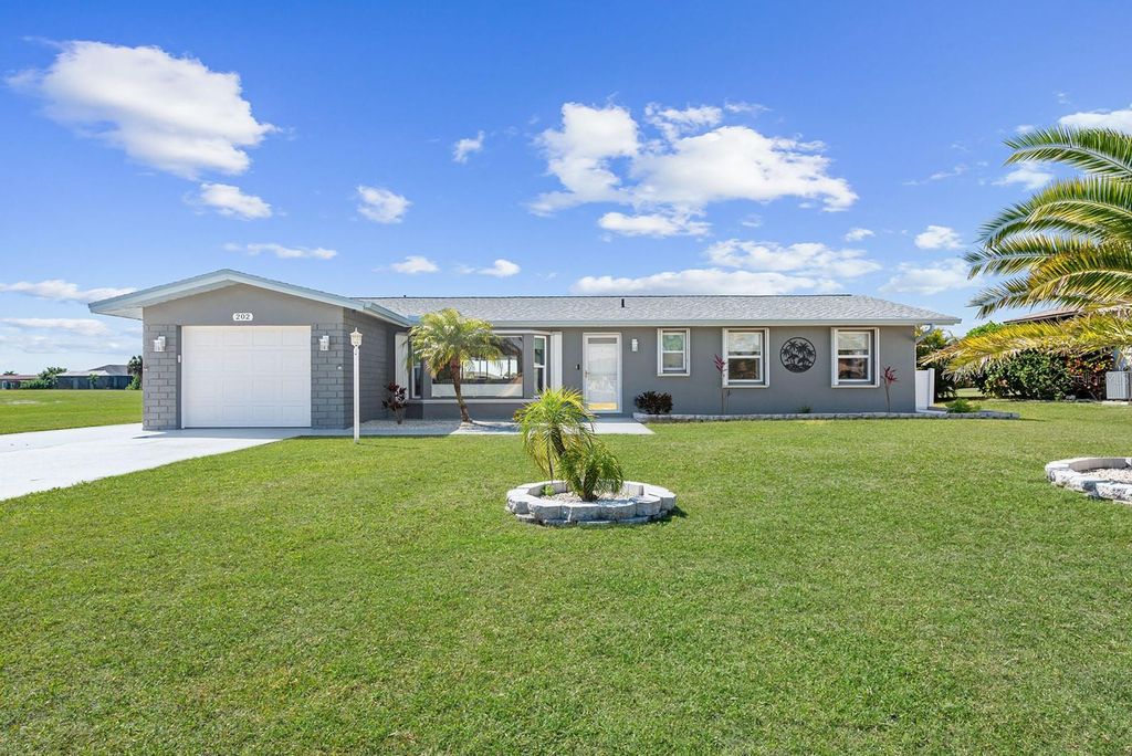 Photo of 202 Caddy Road, Rotonda West, FL 33947 (MLS # D6146788)