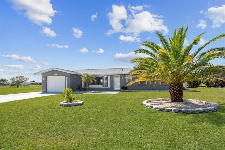 Experience the quintessential Florida lifestyle in this beautifully reimagined, fully remodeled residence situated in the heart of Rotonda West. Perfectly positioned on The Hills Golf Course with a serene pond backdrop, 202 Caddy Road offers a seamless blend of contemporary comfort and absolute peace of mind. This bright and airy open-concept home welcomes you with all-new luxury vinyl flooring and a flood of natural light that highlights the stunning chef’s kitchen. This centerpiece of the home is a showcase of both style and utility, featuring sleek quartz countertops, ample storage within custom soft-close cabinetry, a beautiful tile backsplash, and a suite of brand-new stainless steel appliances. Every detail has been meticulously addressed, from the dedicated interior laundry room with custom cabinets to the fresh interior and exterior paint that extends to expanded driveway and lanai.
Designed for the modern homeowner, this property has been mechanically and structurally revitalized to offer a truly "worry-free" move-in experience. Updates include a new roof, new HVAC and ductwork, a new electrical panel, hurricane impact windows and an impact garage door, complemented by additional high end Hurricane shutters for added protection and insurance efficiency. Step through the sliders to find an outdoor sanctuary designed for entertaining or quiet relaxation. The beautiful heated pool is protected by a freshly re-screened cage and overlooks the manicured greens of the golf course, while the oversized lanai offers an extra storage room for pool equipment and beach necessities. The curb appeal is equally impressive, featuring all-new professional landscaping that frames the home’s crisp, updated exterior.
Offered fully TURNKEY with stylish new furnishings, 202 Caddy Road is an exceptional opportunity for those seeking a year-round residence, a seasonal vacation home, or a high-potential investment for the local rental market. You are perfectly positioned to enjoy the best of the Rotonda area and Cape Haze Peninsula, located just minutes from five championship golf courses and miles of walking trails. Explore the pristine sands of Manasota Beach and the historic charm of Dearborn Street in Englewood, or take a short drive to the world-class fishing and secluded elegance of Boca Grande. With its "like-new" status and prime location, this home is ready for you to move in and start living your best Florida Life!