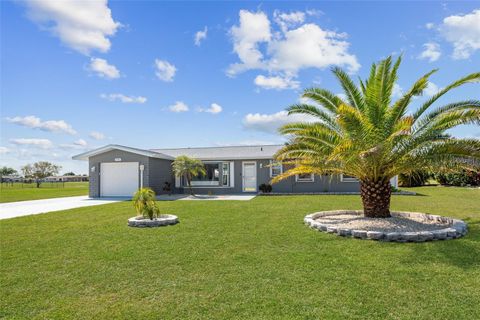 Photo of 202 Caddy Road, Rotonda West, FL 33947 (MLS # D6146788)