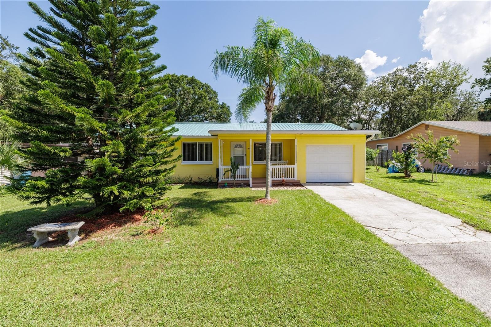 Discover this immaculate, solid block home tucked away on a serene, wooded cul-de-sac. This property is a rare find, offering meticulous maintenance and a wealth of recent upgrades that make it a truly turnkey opportunity. Whether you're a first-time buyer or looking to downsize, you'll love the feeling of moving into a home that needs no work for years to come.No HOA - Park Your Boat, RV, or Bring Your Toys!
The home's most significant asset is its long-term reliability. A lifetime roof warranty, which is fully transferable, provides invaluable peace of mind. All major mechanicals have been recently updated: the septic system, AC, and water heater are just 3-4 years old. The well pump and pressure tank were also replaced within the same period. Enjoy a beautifully updated pool (just 2 years old with a new pump), and new gutters installed last year. The home also features a whole-house water filtration system with reverse osmosis for clean, crisp water throughout. Easy to show!