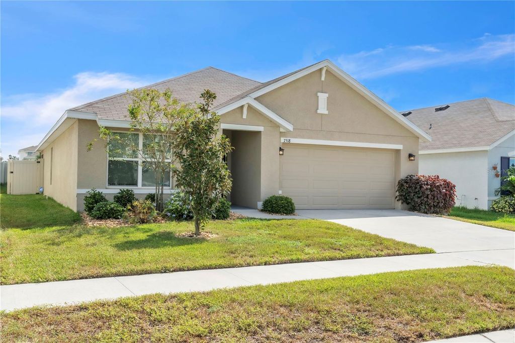 Photo of 7518 Rosewood Garden Loop, Tampa, FL 33637 (MLS # A4667715)