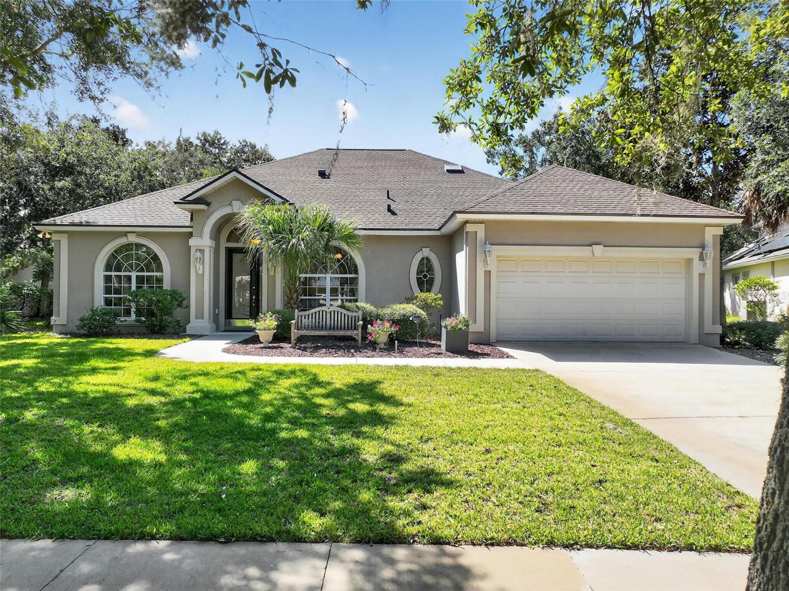 Tucked away in a quiet, tree-lined cul-de-sac in the gated Grand Haven community, this beautifully maintained home offers the perfect blend of comfort and convenience. Featuring 3 bedrooms, 2 full baths, and 2 versatile den/office rooms. The open floor plan is filled with natural light from showcase windows and offers a seamless flow for everyday living and entertaining. The spacious great room highlights a granite surrounded fireplace and open space to the kitchen, making it inviting to gather with family and friends The primary suite boasts tray ceilings, dual walk-in closets, a soaking tub, double vanities, and a glass slider leading to your private porch overlooking a serene and private retreat. Recent updates bring peace of mind, including a new roof (2022), new HVAC system (2021) still under warranty, new hot water heater (2025) and new and updated appliances. Additional features include crown molding, rounded corners, 8-foot interior doors, and French doors that elevate the home’s design. Living in Grand Haven means enjoying Florida’s premier gated lifestyle community. Nestled along the Intracoastal Waterway and home to a Jack Nicklaus Signature golf course, residents enjoy over 1,400 acres of natural beauty along with resort-style amenities: a restaurant, 2 pools, jacuzzis, tennis, pickleball, croquet, basketball, bocce, fitness centers, and a wide range of clubs and social activities. Located at the convenient north end of Grand Haven, you’re just a 10-minute drive to the beach and close to shops and local dining. This home truly has it all: privacy, updates, and access to an active, coastal lifestyle.
