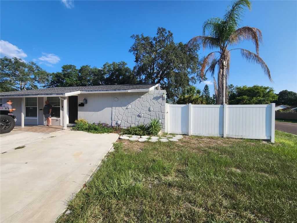 Photo of 8518 Woodlake Drive, Tampa, FL 33615 (MLS # TB8470972)