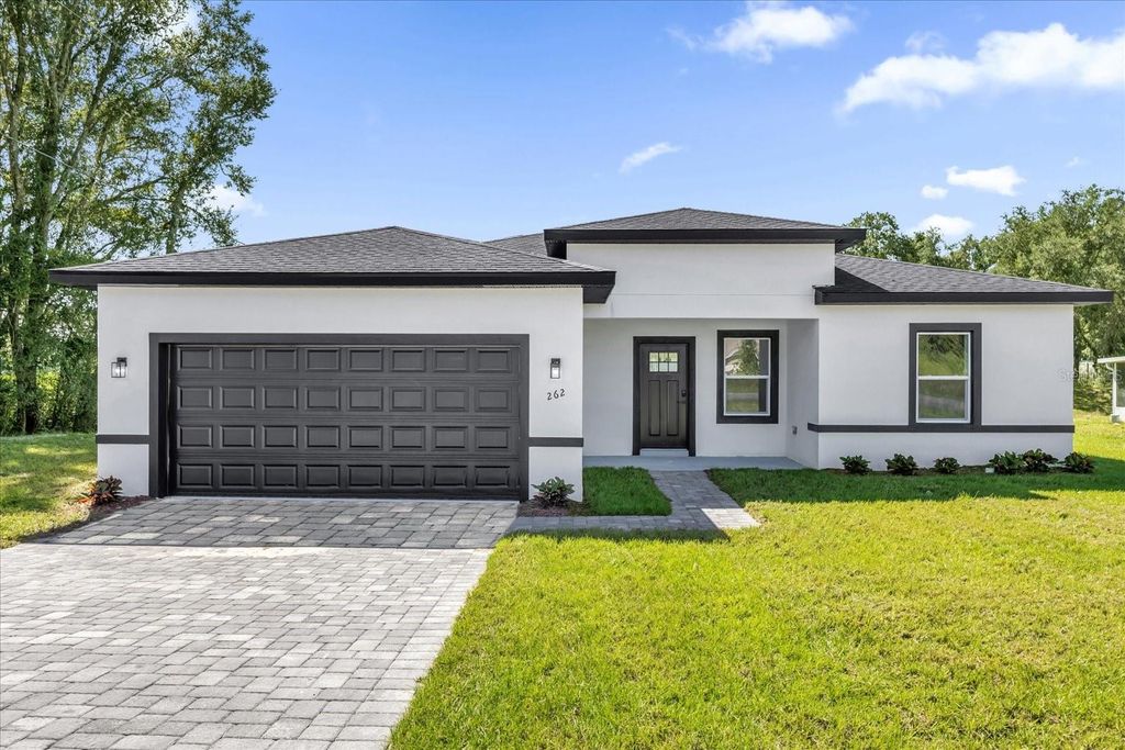 Photo of 262 Marion Oaks Trail, Ocala, FL 34473 (MLS # O6352538)